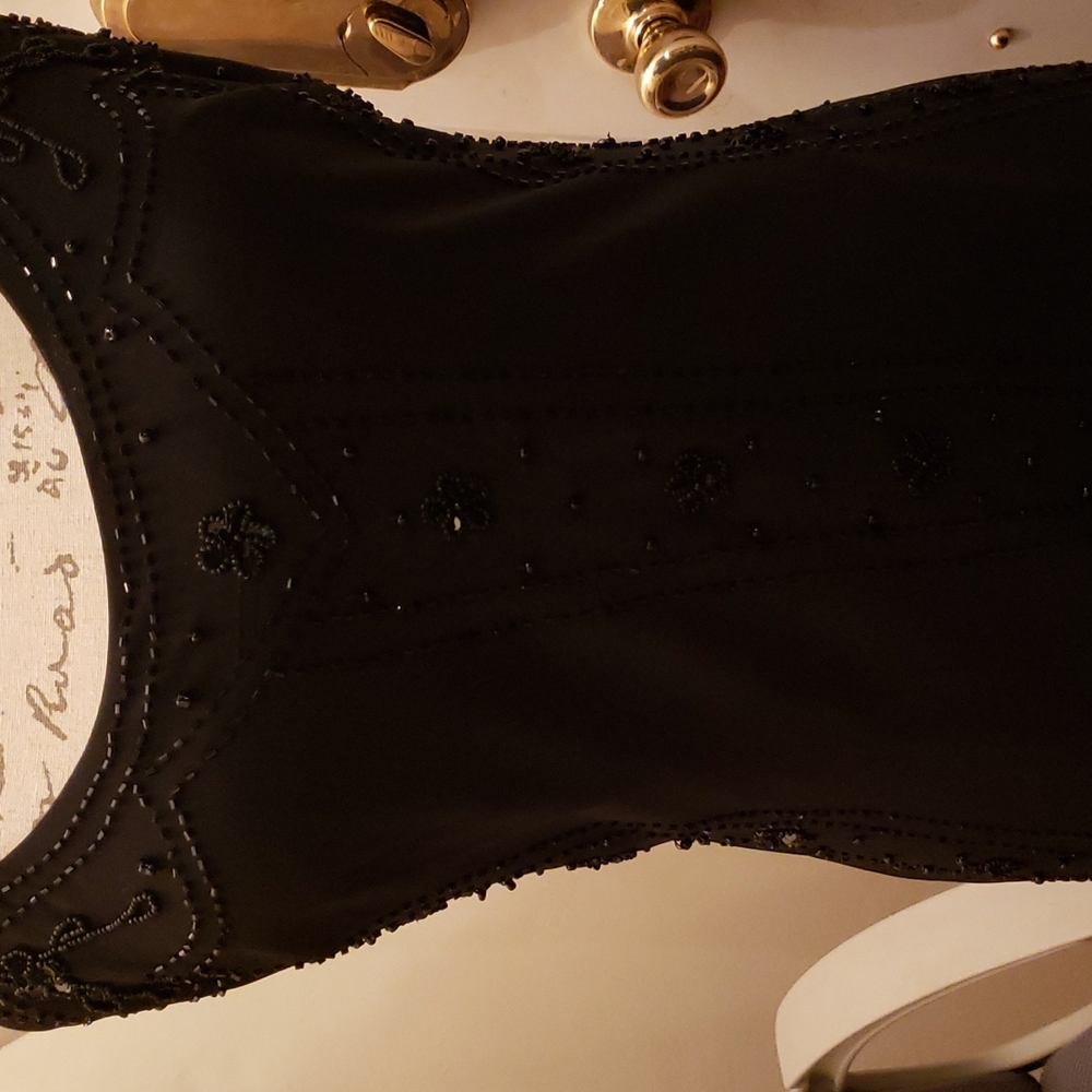 Woman's black "Erica Hannah" cocktail dress size 4...NEW.